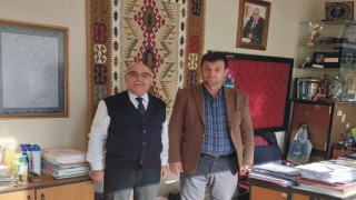 Yunus Temiz, MHP Osmaniye İl Başkanı Yusuf Çomu'yu ziyaret etti